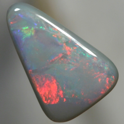 SOLID SEMI BLACK OPAL Rolling flashes of red and blue